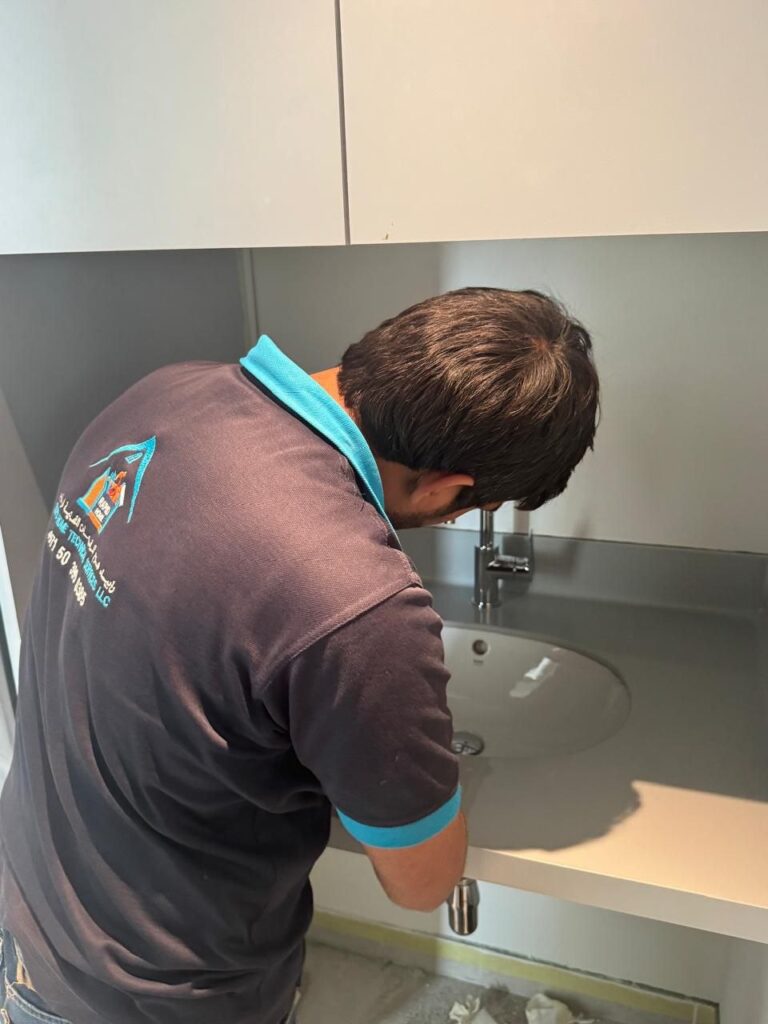 Rapid Home technician carrying out plumbing work