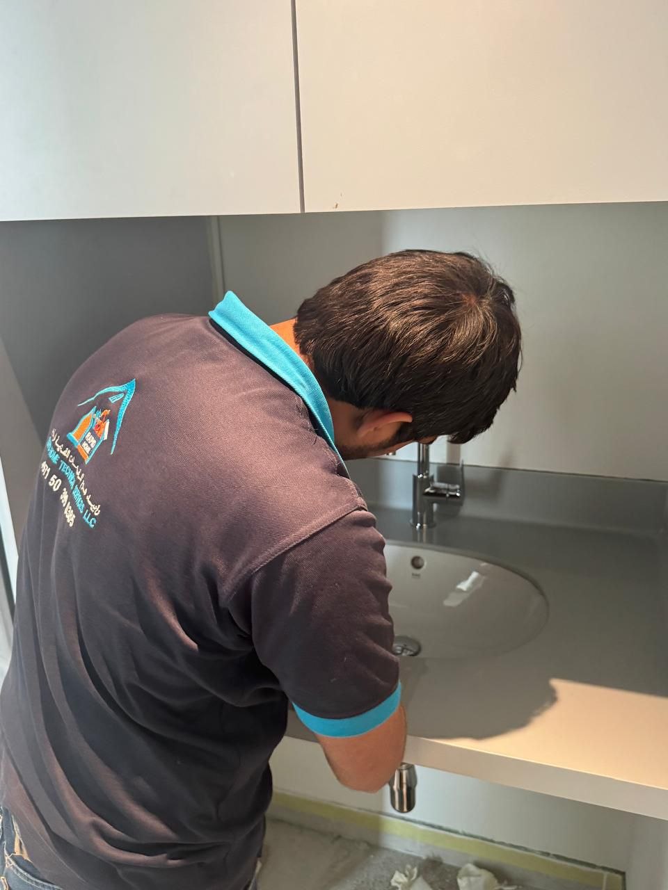 Rapid Home technician carrying out plumbing work